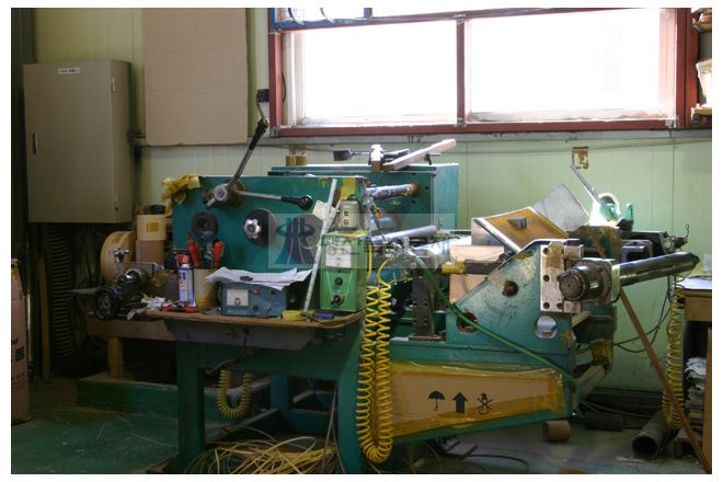 Roll cutting M/C